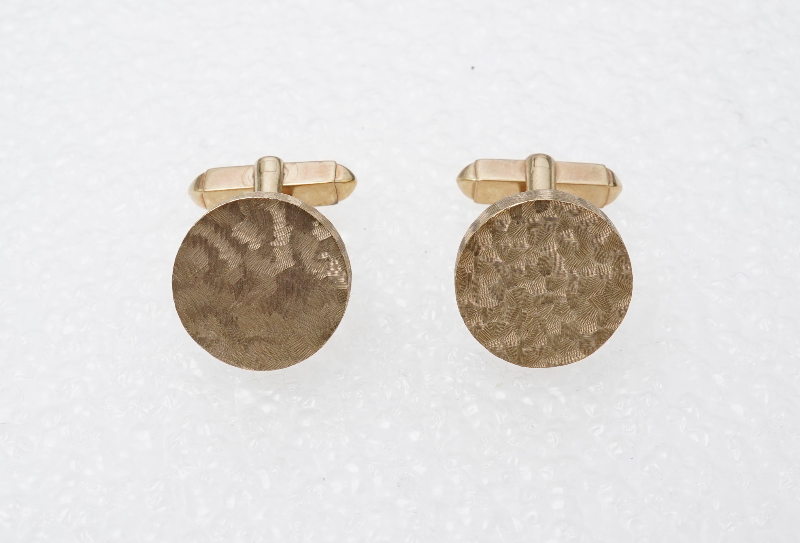 A pair of gold cufflinks, circa 1964